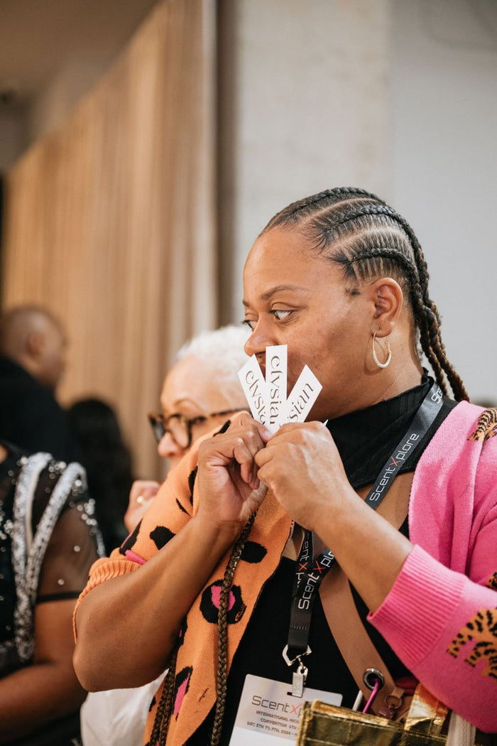 Holding Elysian blotters up to smell