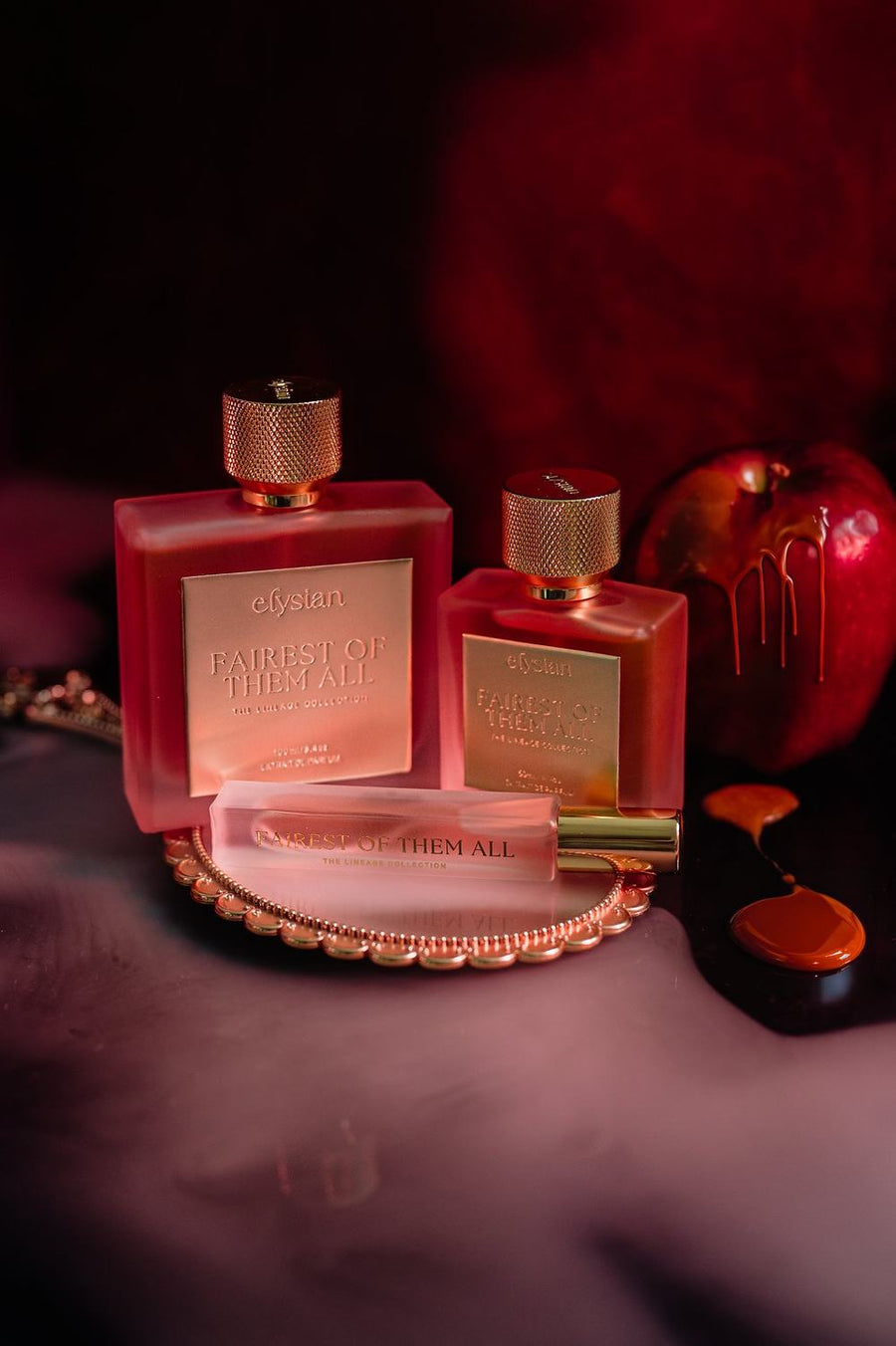 Fairest of Them All bottles beside red apples