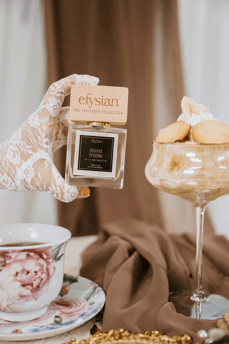 Banana Pudding perfume with a teacup, lace glove and vanilla wafers